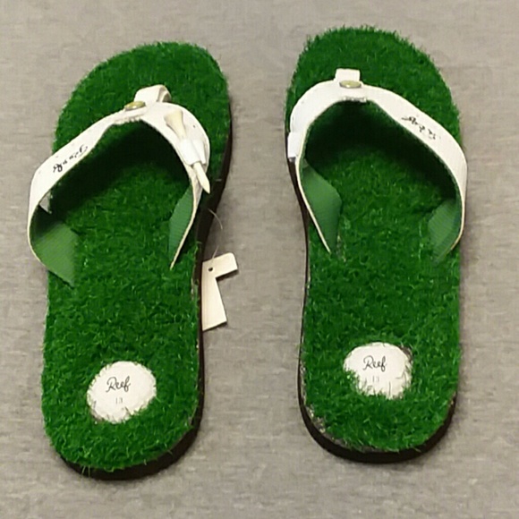 reef golf flip flops with spikes